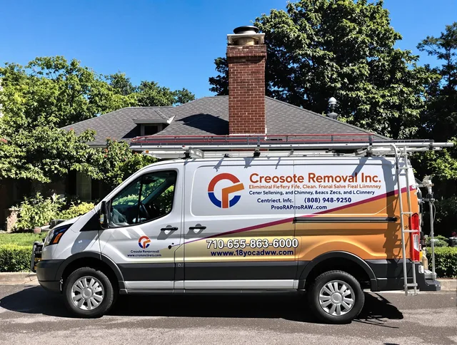 Scituate Chimney Sweep technician removing creosote safely in Scituate, RI